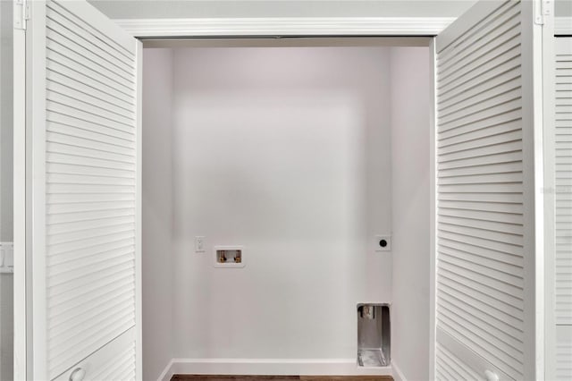 washroom with washer hookup and hookup for an electric dryer