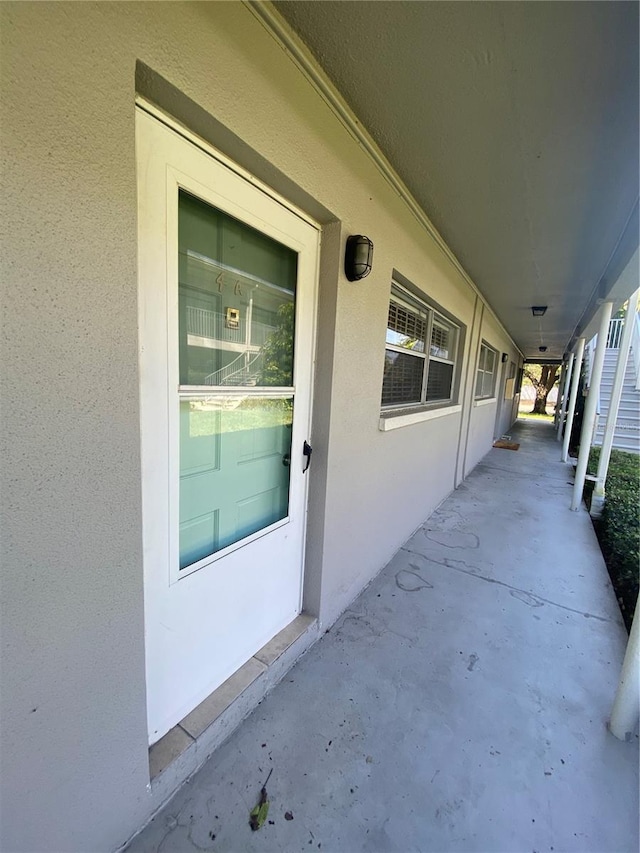 entrance to property with a patio area