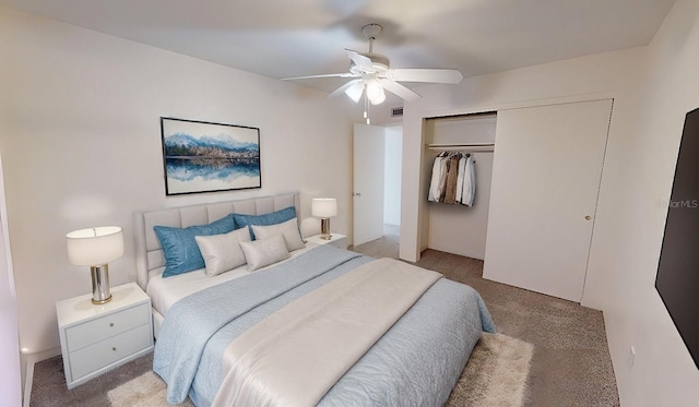 bedroom with a closet, light colored carpet, and ceiling fan