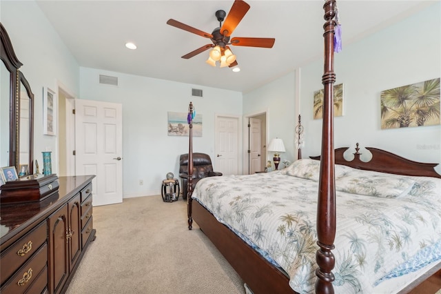 bedroom with ceiling fan, a closet, and light carpet