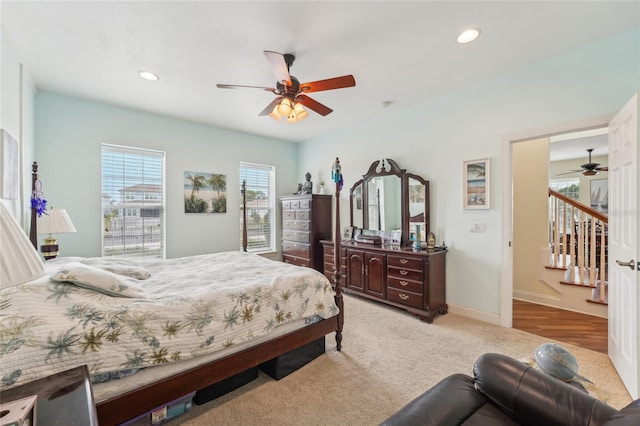 carpeted bedroom featuring ceiling fan