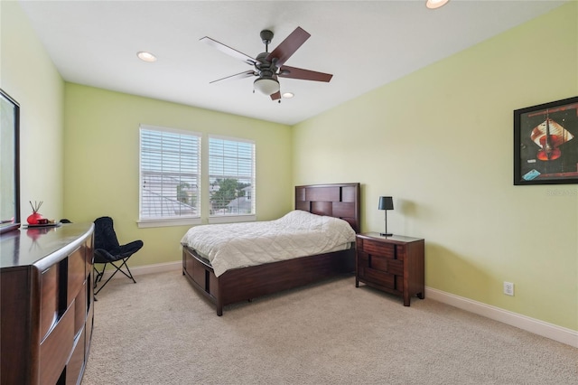 carpeted bedroom with ceiling fan