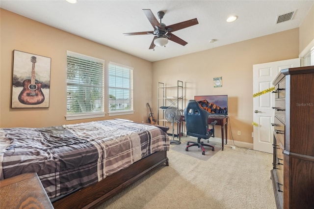 carpeted bedroom featuring ceiling fan