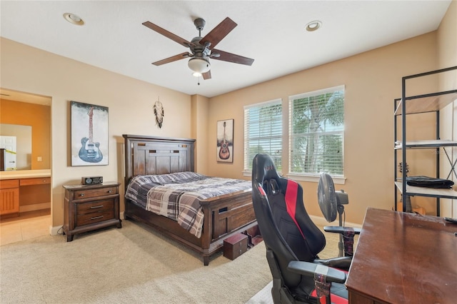 bedroom featuring ceiling fan and light carpet