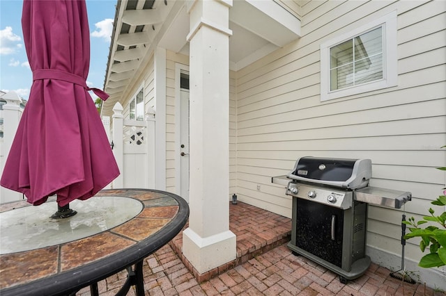 view of patio featuring a grill