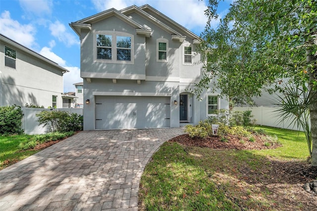 view of front of home with a garage