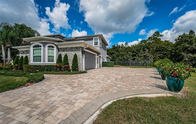 exterior space featuring a front yard and a garage