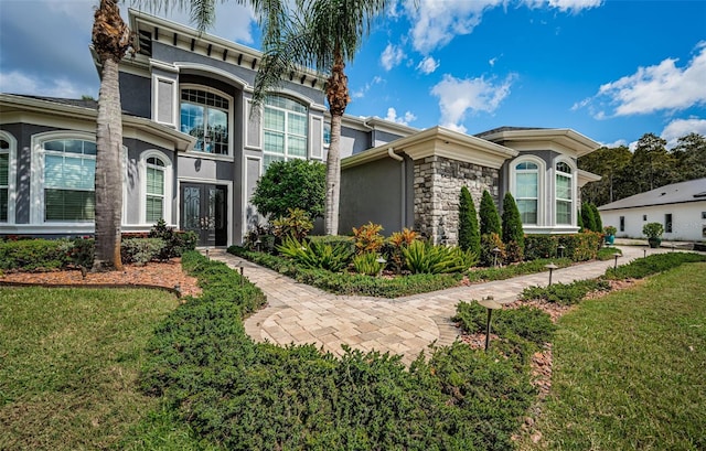 view of front facade with a front yard