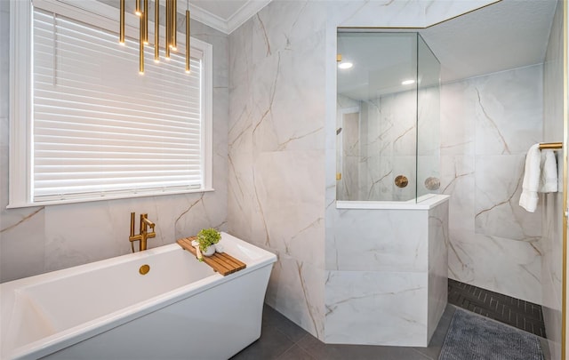 bathroom with plus walk in shower, ornamental molding, tile walls, and tile patterned floors