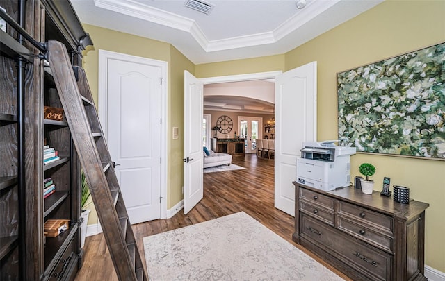 interior space featuring ornamental molding, a textured ceiling, and dark hardwood / wood-style flooring