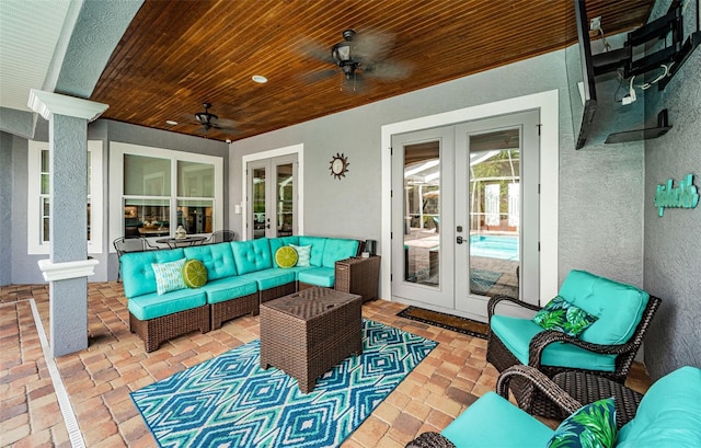 view of patio / terrace featuring ceiling fan, french doors, and an outdoor hangout area