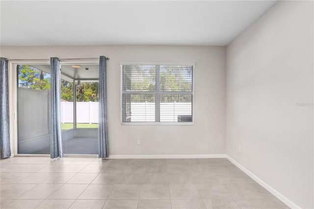 empty room featuring light tile patterned flooring