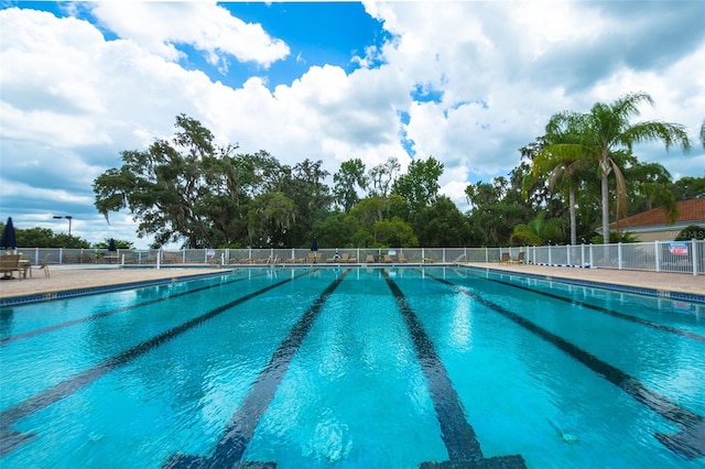 pool featuring fence