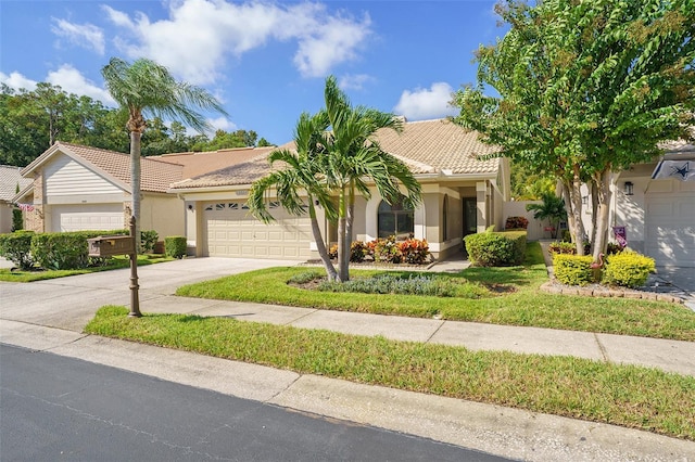 view of front of property with a garage