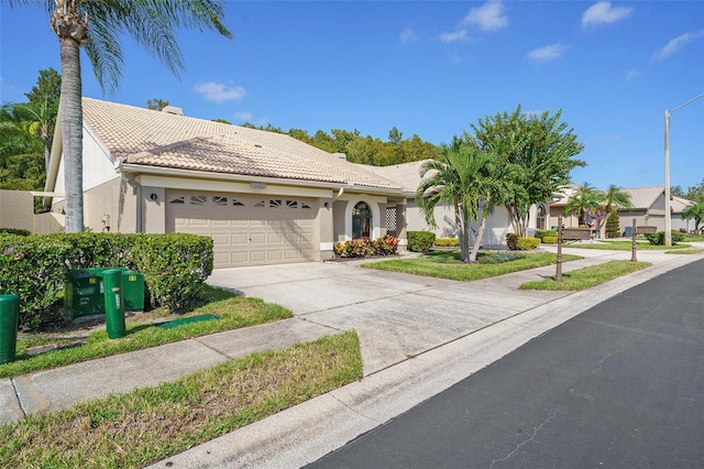 view of front of property with a garage