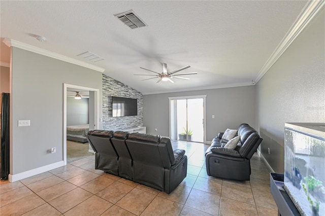 tiled living room with a textured ceiling, crown molding, vaulted ceiling, and ceiling fan