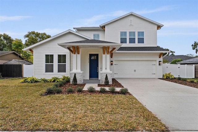 view of front facade featuring a garage and a front lawn