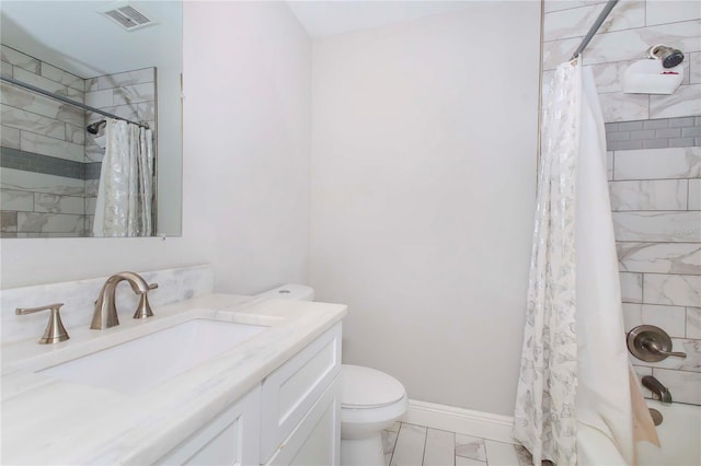 full bathroom with vanity, toilet, and shower / bath combo