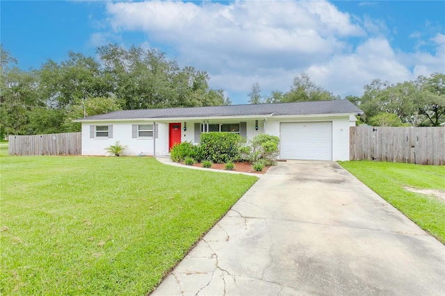 single story home featuring a front yard and a garage