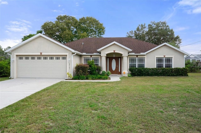 ranch-style home with a garage and a front yard