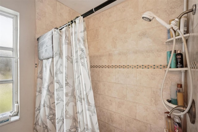 bathroom with a shower with curtain