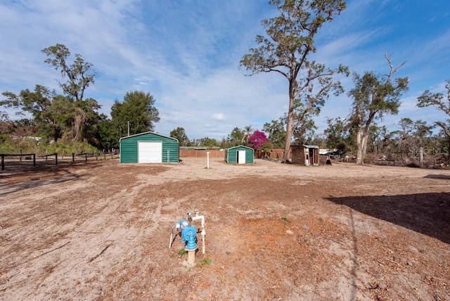 view of yard featuring a storage unit