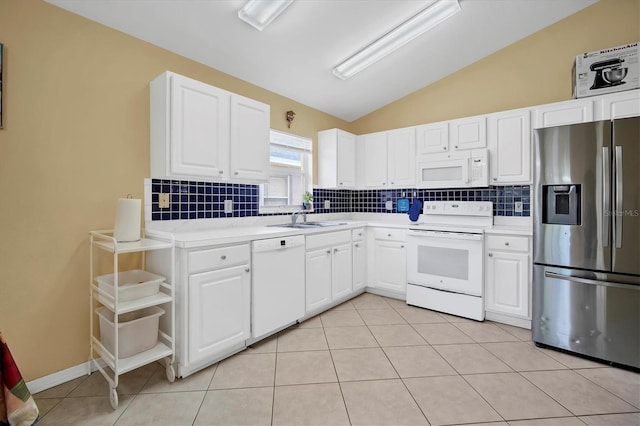 kitchen with white cabinetry, light tile patterned flooring, white appliances, lofted ceiling, and sink