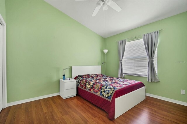 bedroom with ceiling fan and hardwood / wood-style floors