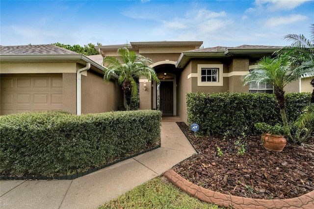 view of front of property featuring a garage