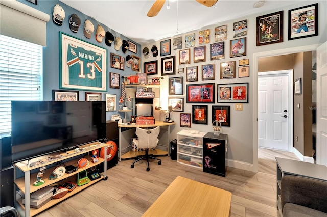 office space featuring ceiling fan and light hardwood / wood-style floors