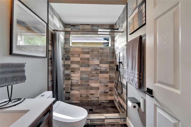 bathroom featuring vanity, toilet, and a shower with curtain