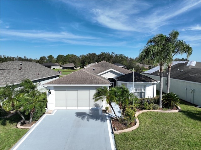 single story home with a front lawn and a garage