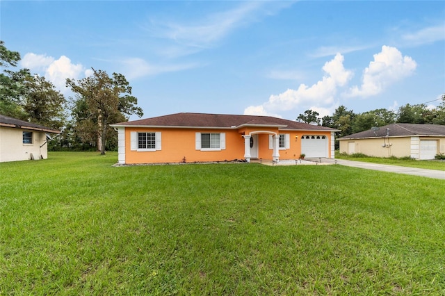 ranch-style house with a garage and a front lawn