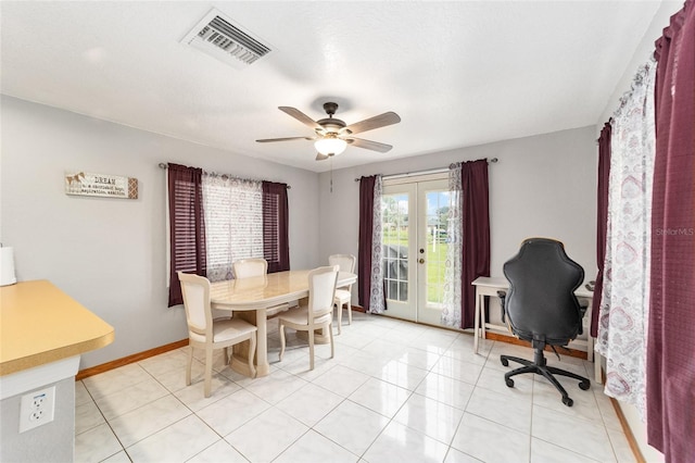 dining space featuring french doors, light tile patterned floors, and ceiling fan