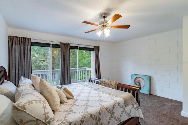 bedroom with ceiling fan, brick wall, access to exterior, and carpet flooring