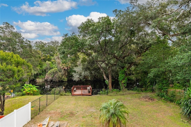 view of yard with a wooden deck