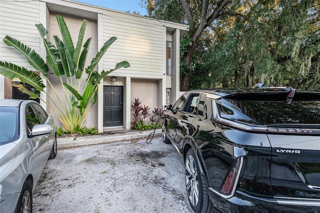 view of property exterior with a garage