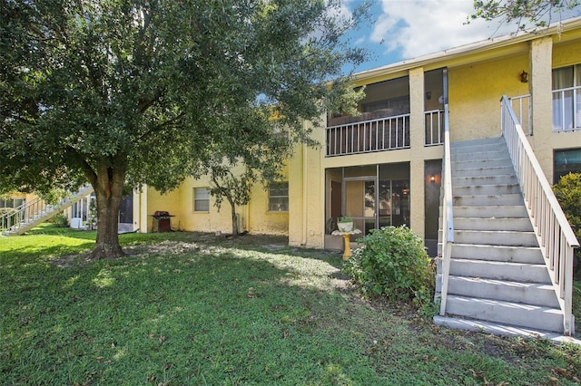 exterior space featuring a lawn