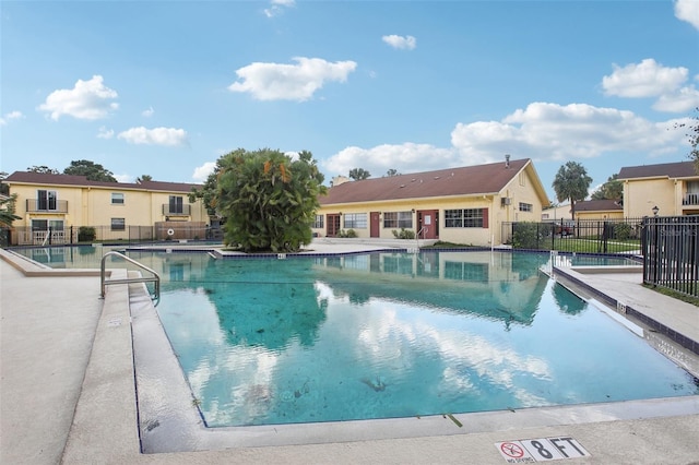 view of swimming pool with a patio area