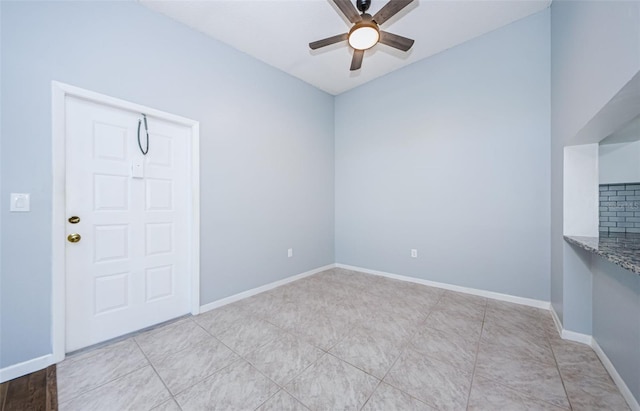 unfurnished room featuring ceiling fan