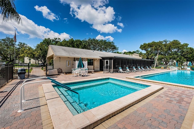 view of swimming pool with a patio