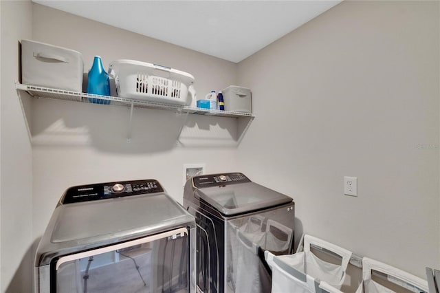 laundry room featuring independent washer and dryer