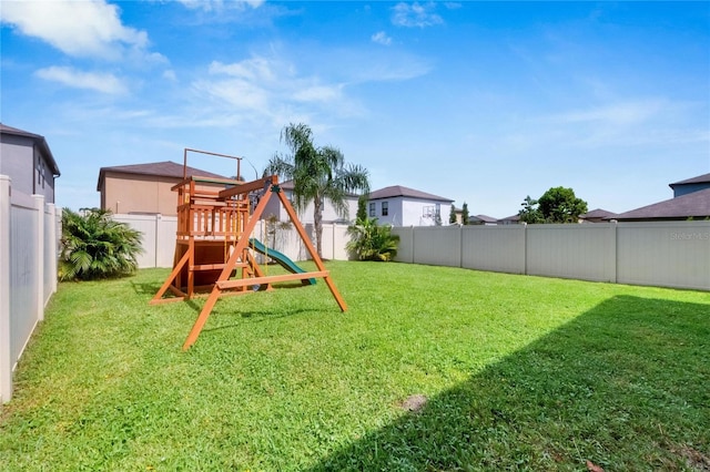 view of jungle gym with a yard