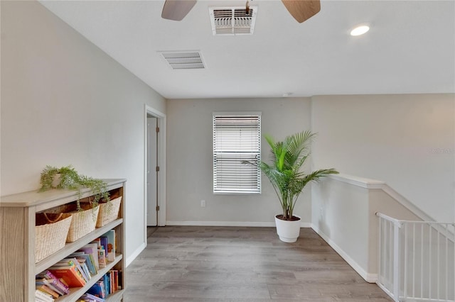 sitting room featuring light wood-type flooring