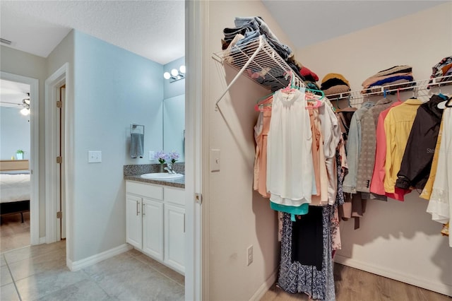 bathroom featuring vanity and a textured ceiling