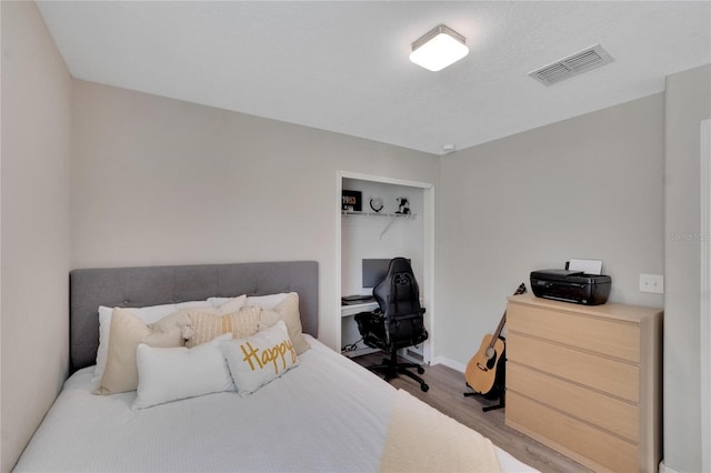 bedroom featuring light wood-type flooring