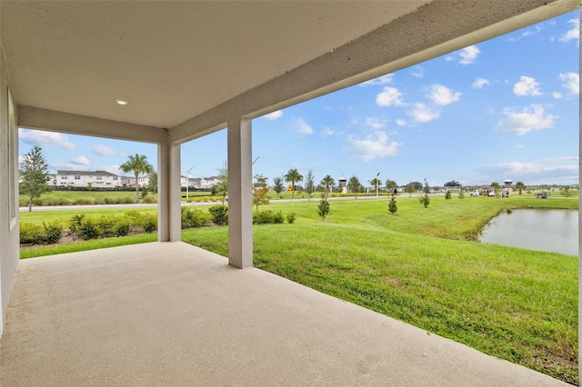 view of patio featuring a water view