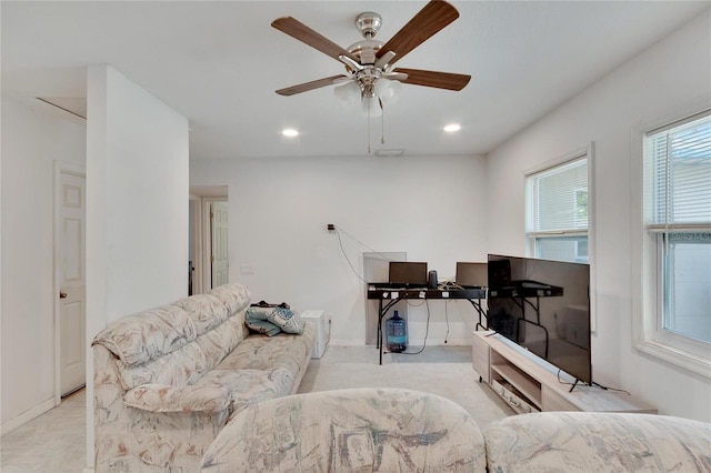 living area with a ceiling fan, baseboards, and recessed lighting