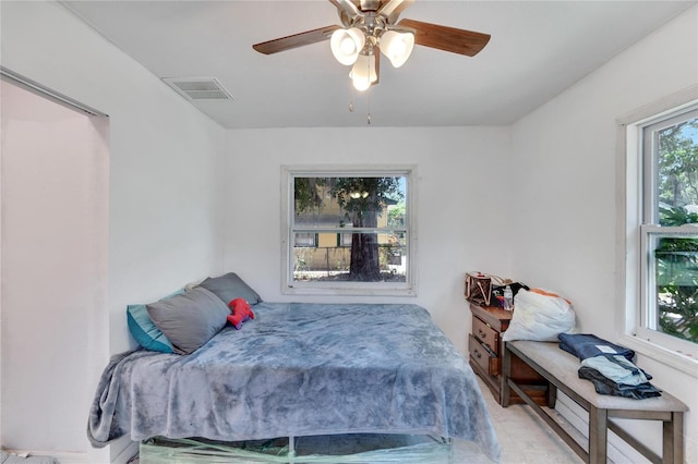 bedroom featuring ceiling fan