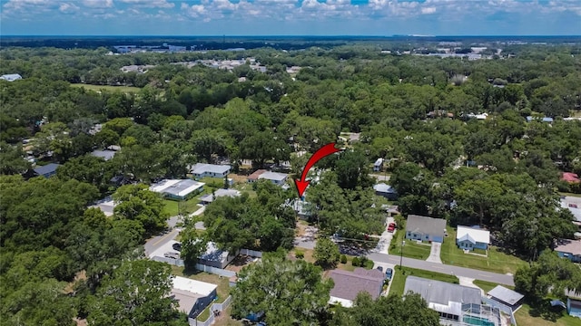 aerial view featuring a residential view and a forest view